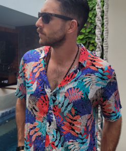 Man wearing a unilome brand hawaiian shirt called the fabulous fern.