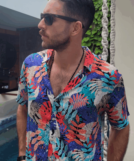 Man wearing a unilome brand hawaiian shirt called the fabulous fern.