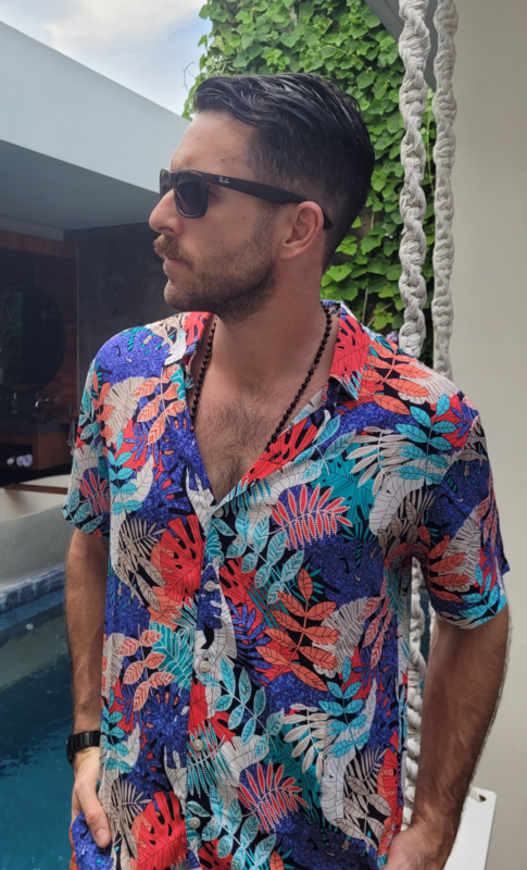 Man wearing a unilome brand hawaiian shirt called the fabulous fern.
