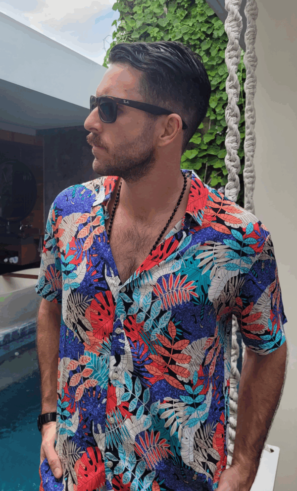 Man wearing a unilome brand hawaiian shirt called the fabulous fern.